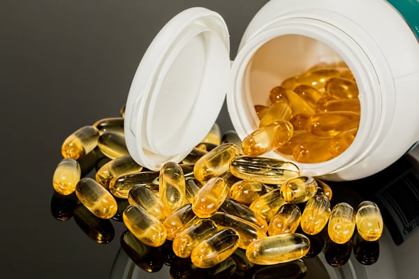 Gold capsules on a table