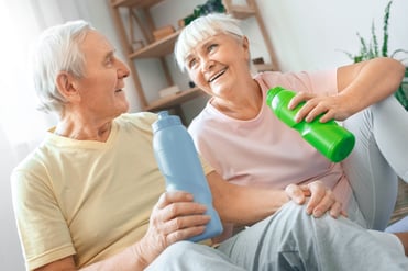 Man and woman finishing with exercise.