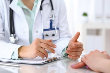 Doctor discussing test results with patient.