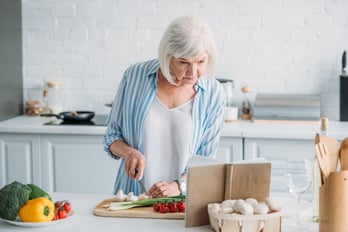 Old woman cooking