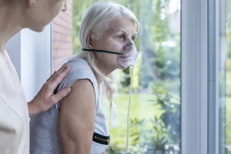 Woman with oxygen mask