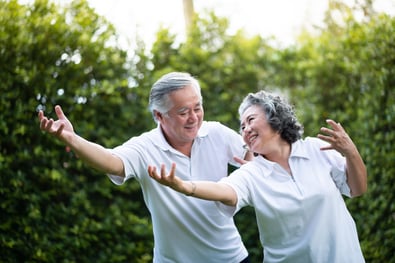 Man and woman doing Tai Chi