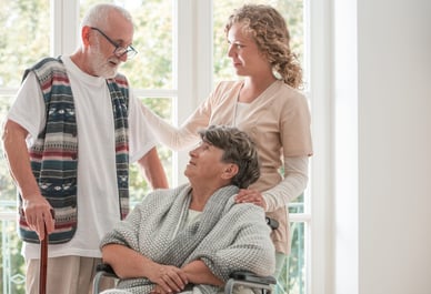 Woman speaking with caretaker