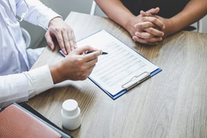 Doctor discussing test results with a patient.