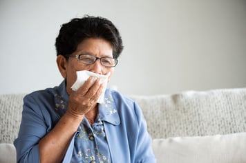 Woman coughing