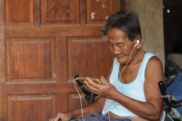 Woman playing games on her phone.