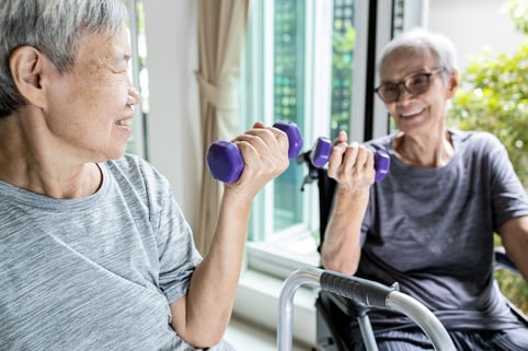 Old women lifting weights