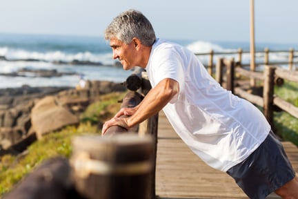 Man exercising on the beach.