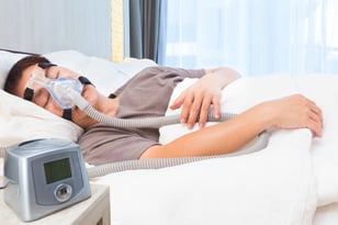 Man sleeping with CPAP